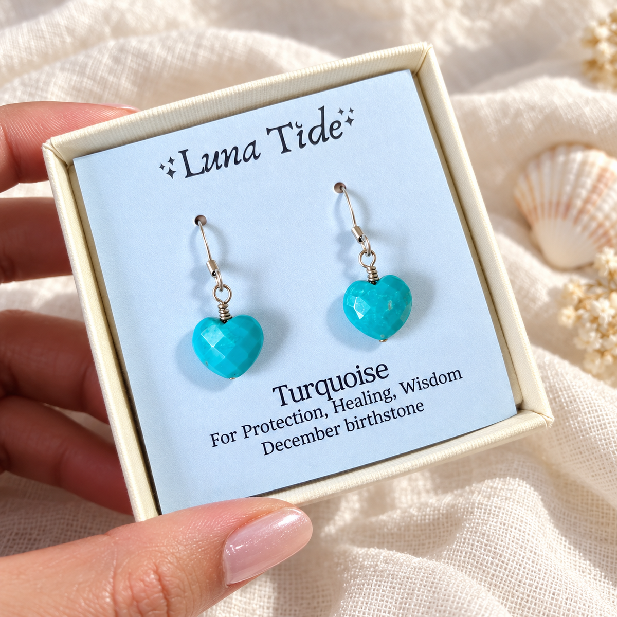Turquoise crystal heart dangle earrings in a Luna Tide gift box